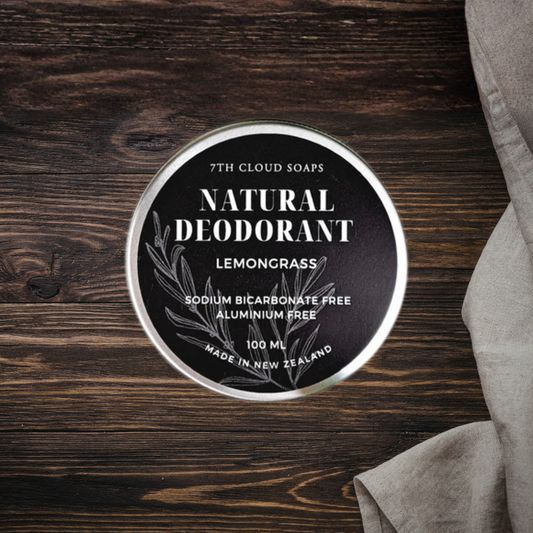 7th Cloud Soaps natural deodorant container on a wooden surface