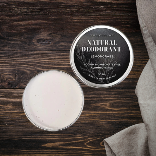 Natural deodorant in a tin on a wooden surface