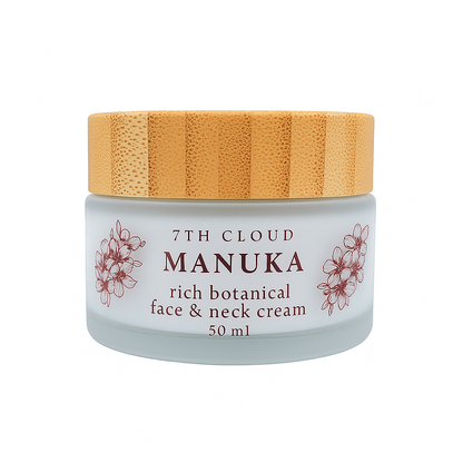 Manuka rich botanical face & neck cream jar with wooden lid on a white background